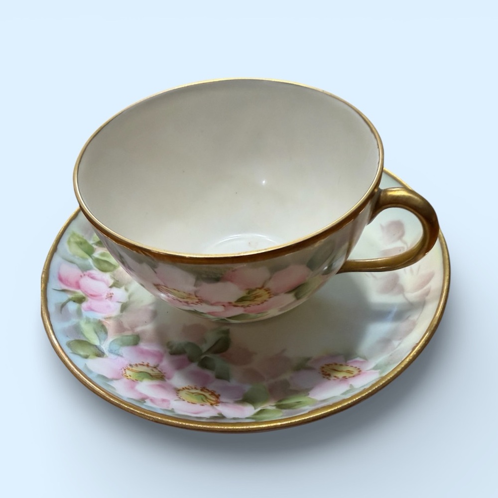 Haviland France porcelain teacup and saucer.  Gold trim, great vintage condition